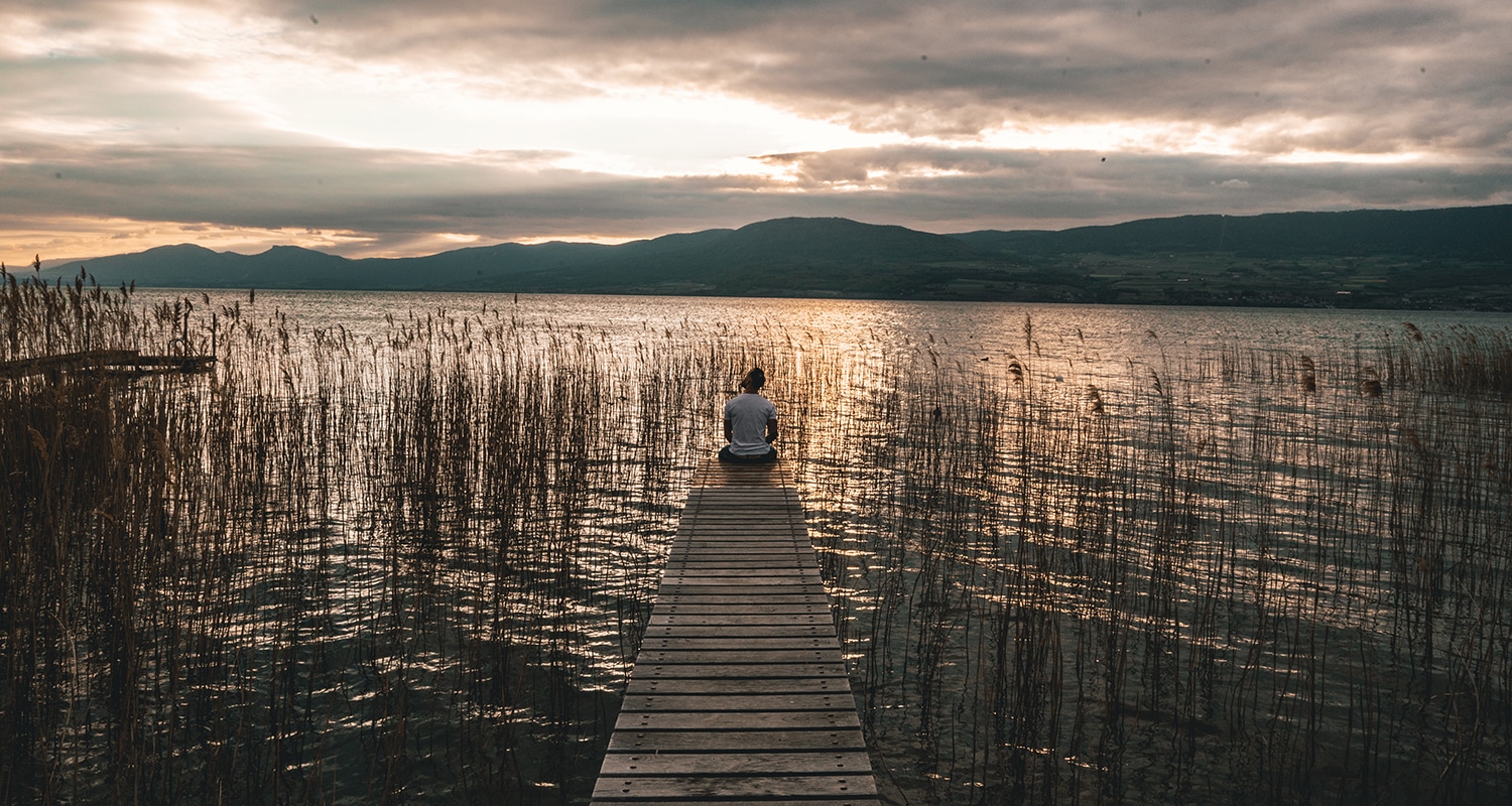 Le lac de la Grande Cariçaie au coucher du soleil